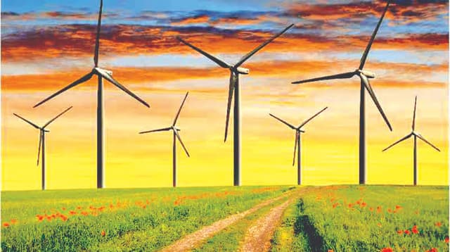 Wind turbines at a renewable energy facility, illustrating Zimbabwe's wind power development plans.