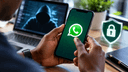 Person checking WhatsApp account security settings on a smartphone.