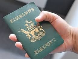 Zimbabwe biometric e-passport opened on a desk.