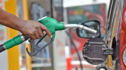 Motorists queue at a petrol station as fuel prices rise across several African countries.