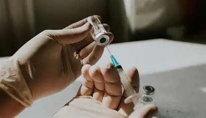 Health worker preparing lenacapavir HIV prevention injection during Zimbabwe rollout programme